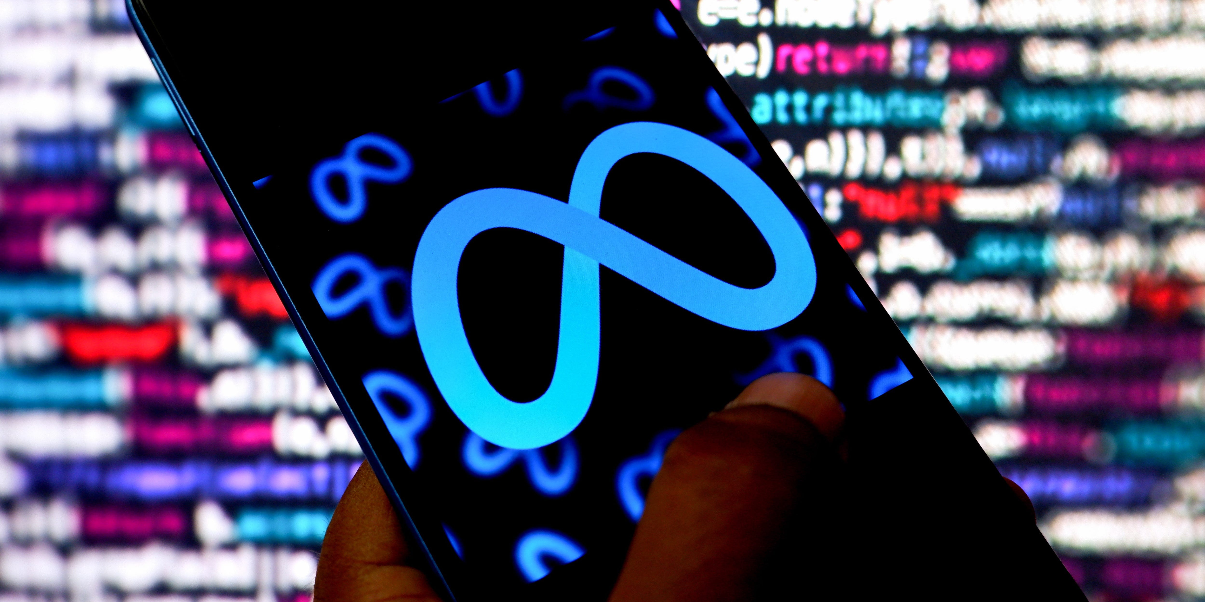 Illustration of Meta logo seen on a phone