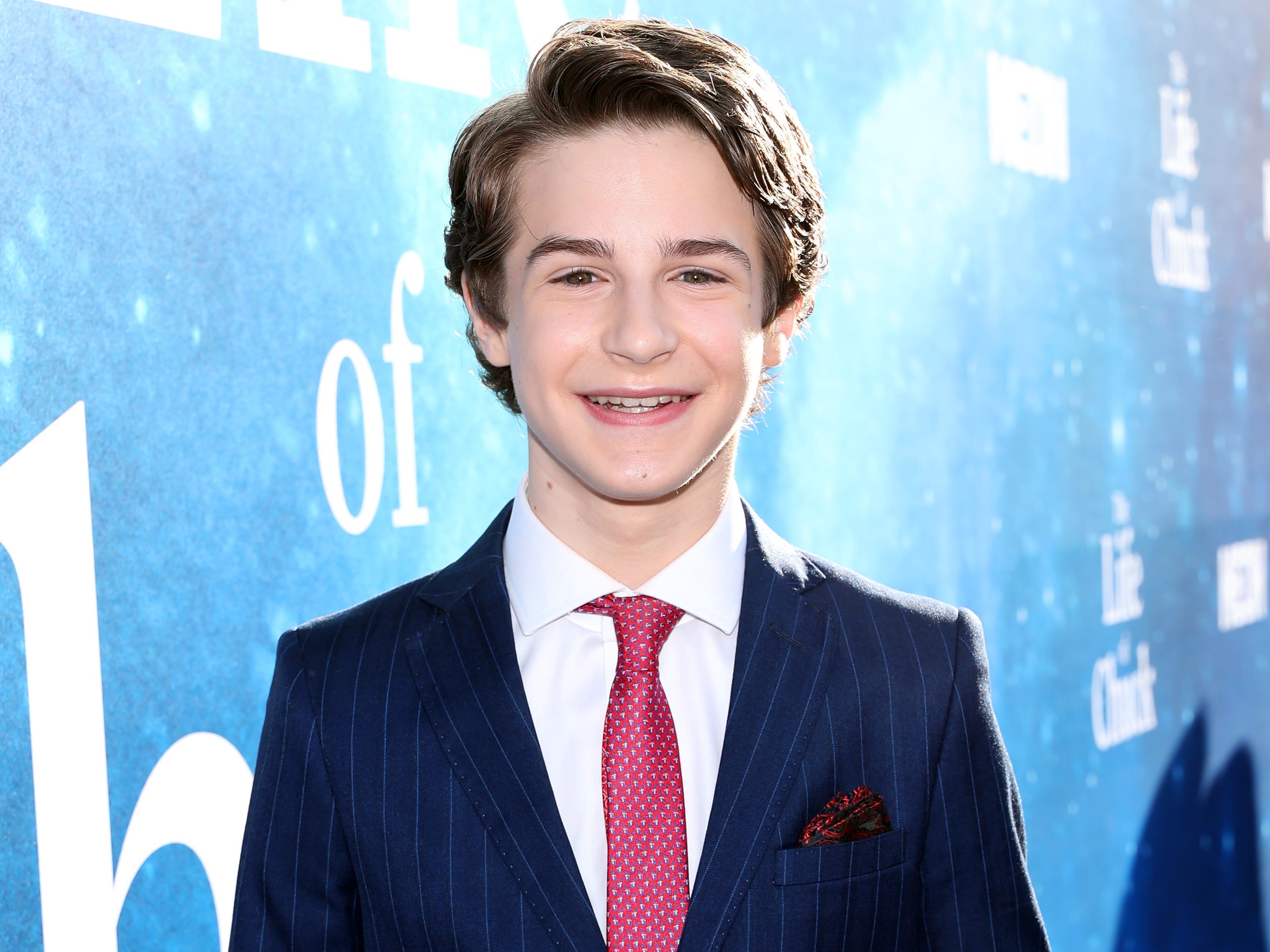 Benjamin Pajak in a blue suit