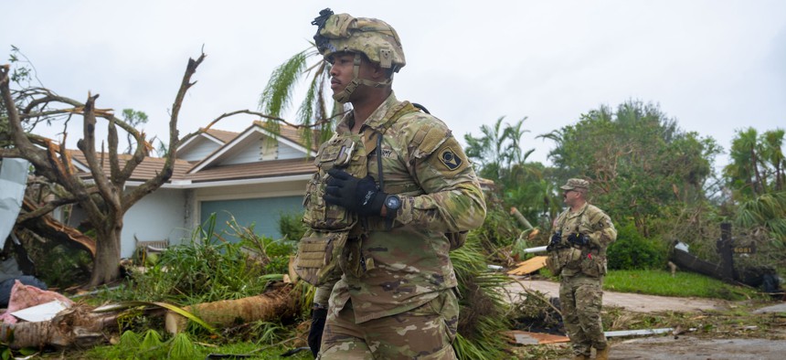 Soldiers from the Florida and South Carolina National Guard search for residents in need of assistance near Stuart, Florida, Oct. 10, 2024.