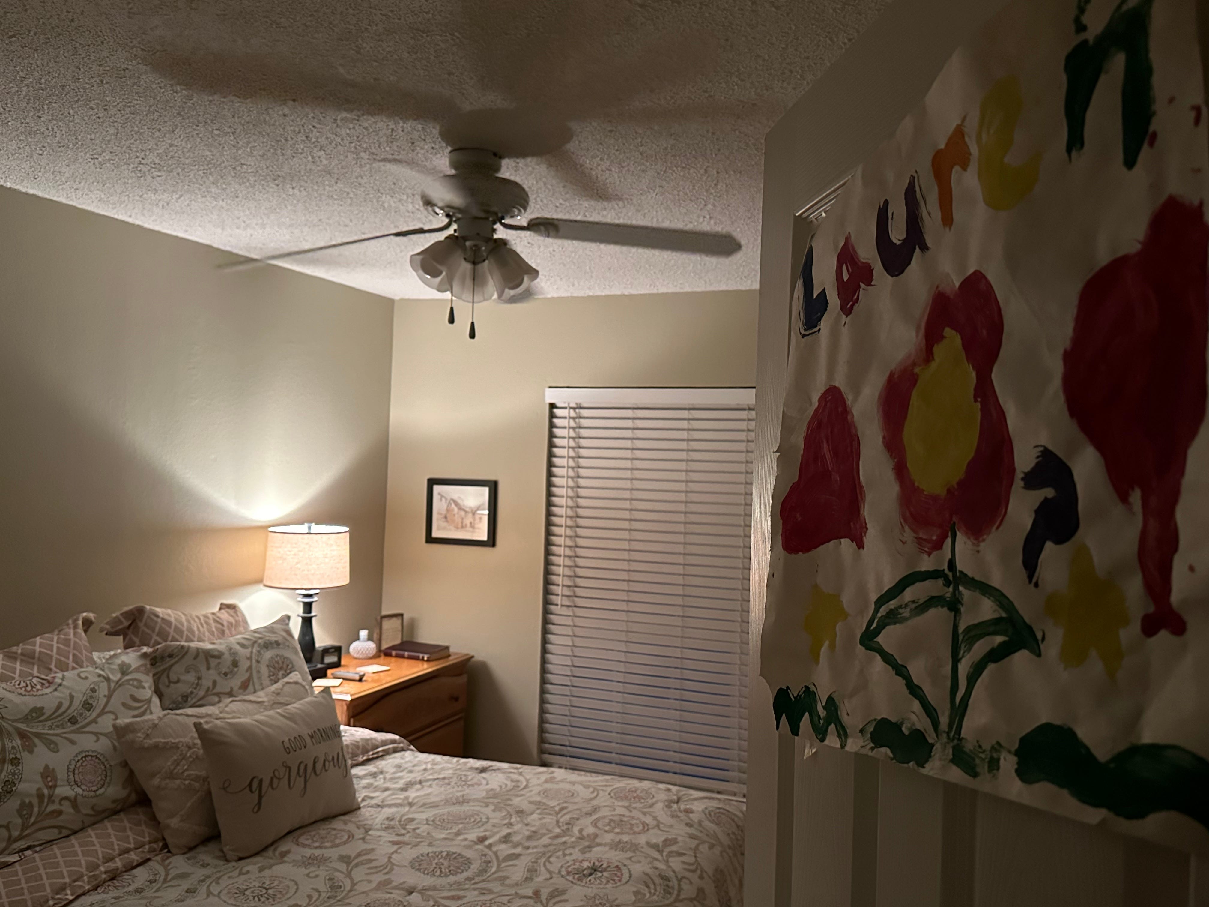 The author's bedroom in her childhood home, complete with a sign on the door that says 