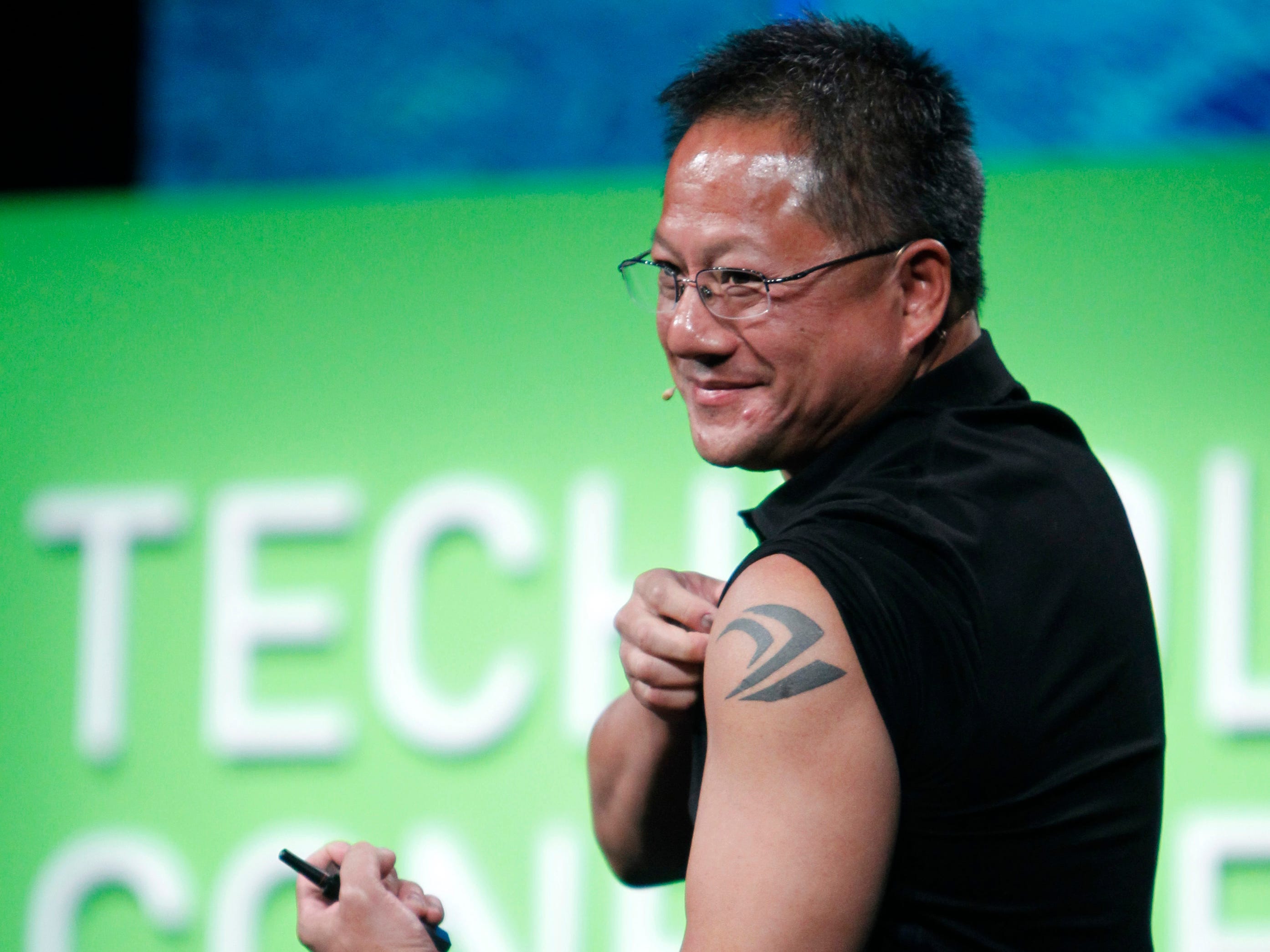 Nvidia founder, president and CEO Jensen Huang displays his tattoo in September 2010.