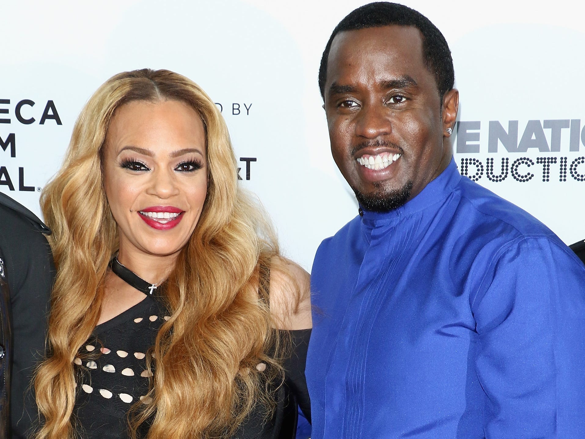 Faith Evans and rapper/actor Sean Combs attend the world premiere of 