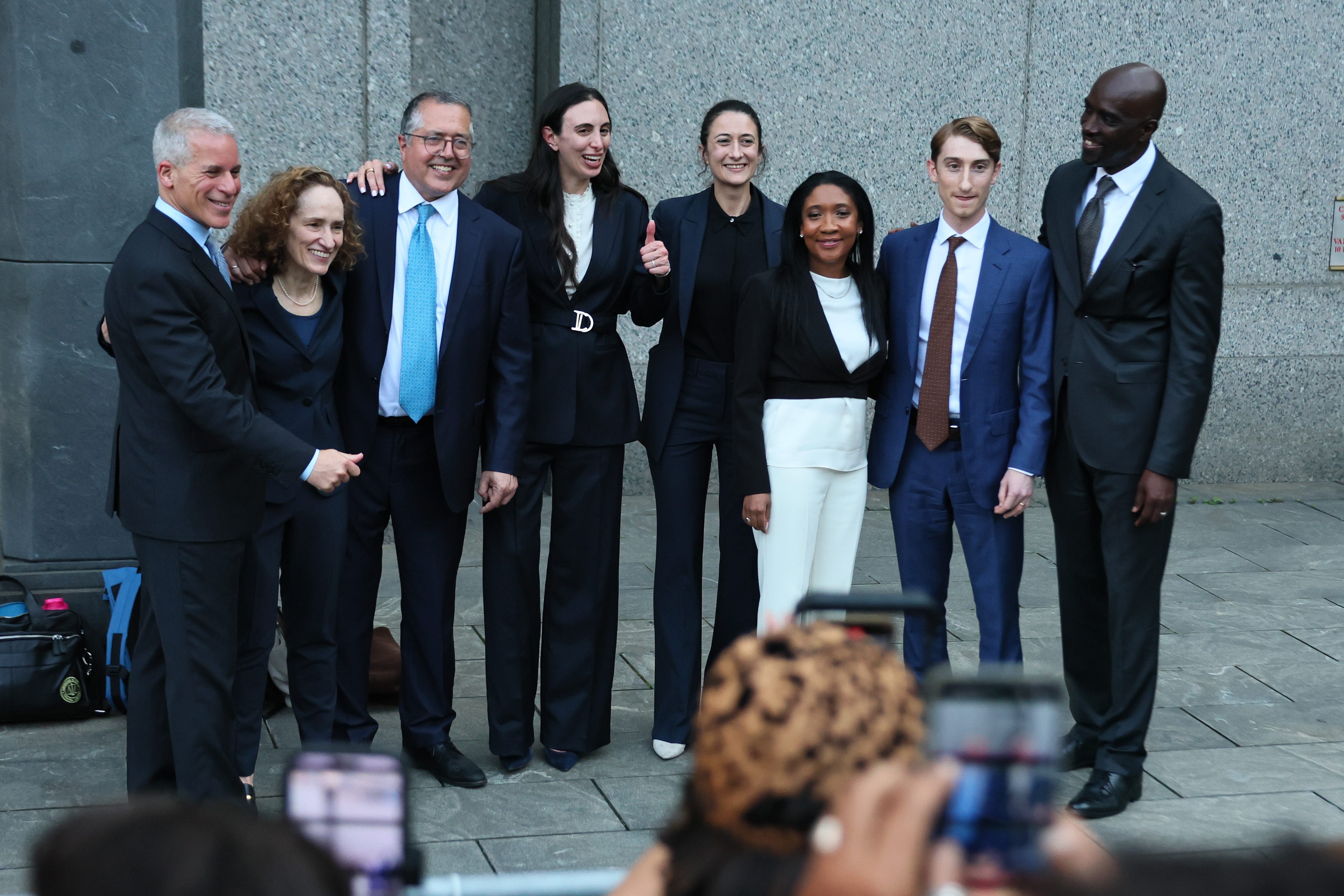 sean diddy combs lawyers pose