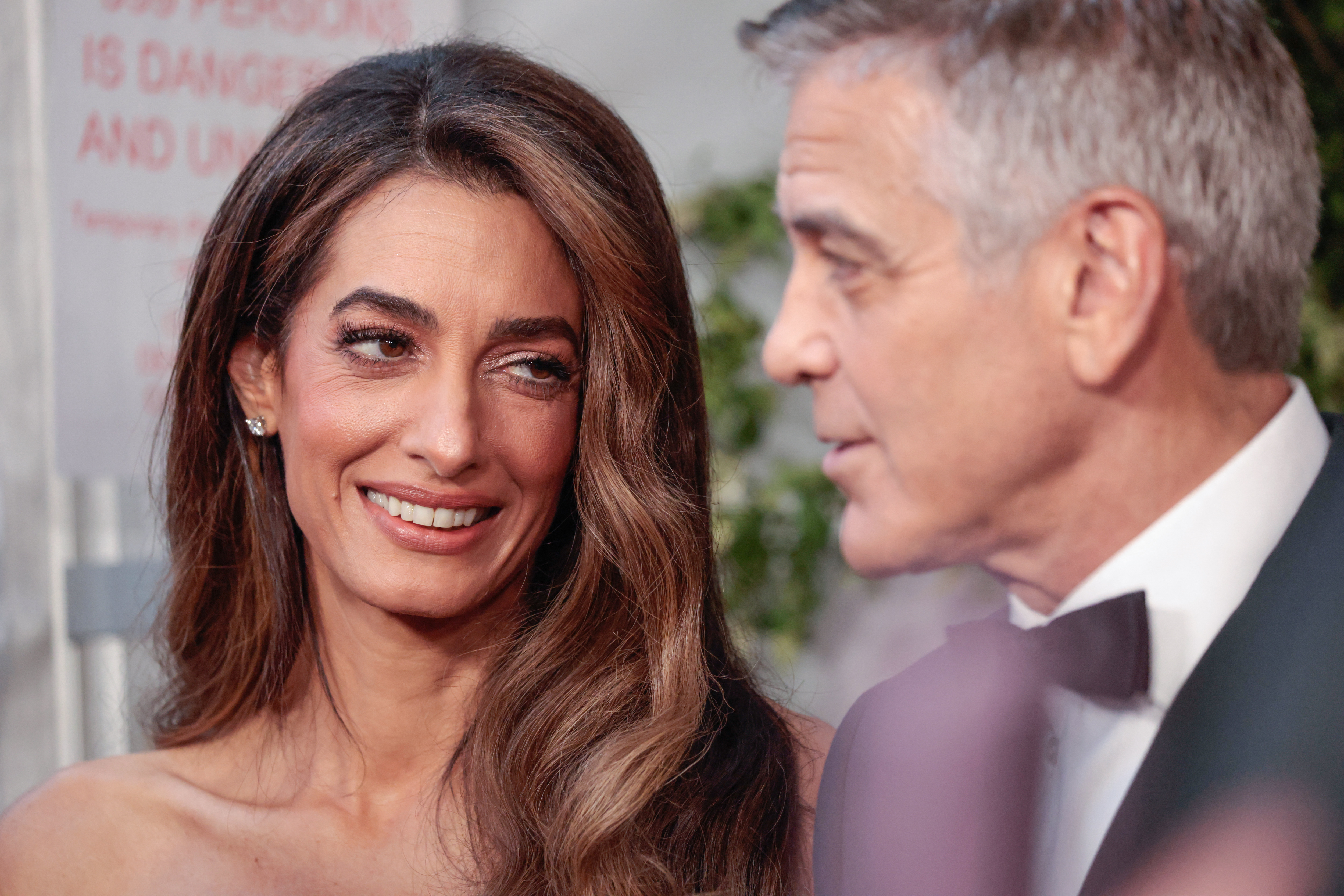 Amal and George Clooney close-up photo. 
