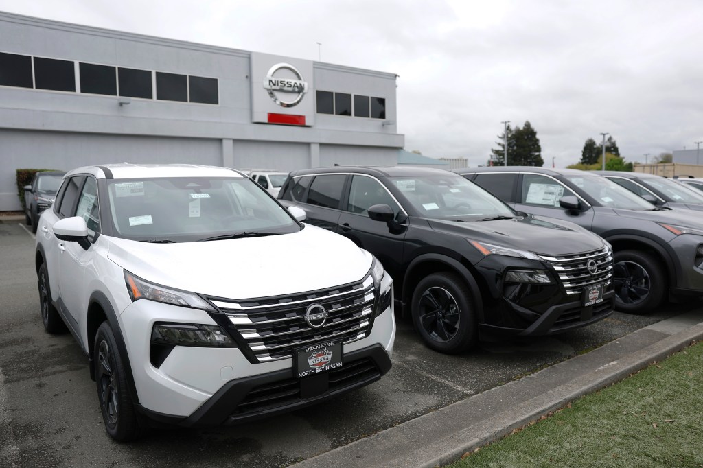 Nissan Rogue SUVs at a dealership.