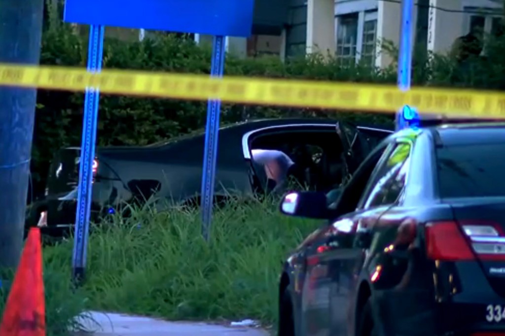 Police investigate Patton's car after the shooting on June 16, 2025.