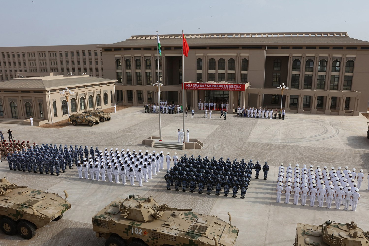Chinese People's Liberation Army personnel attend the opening ceremony of China's military base in Djibouti.