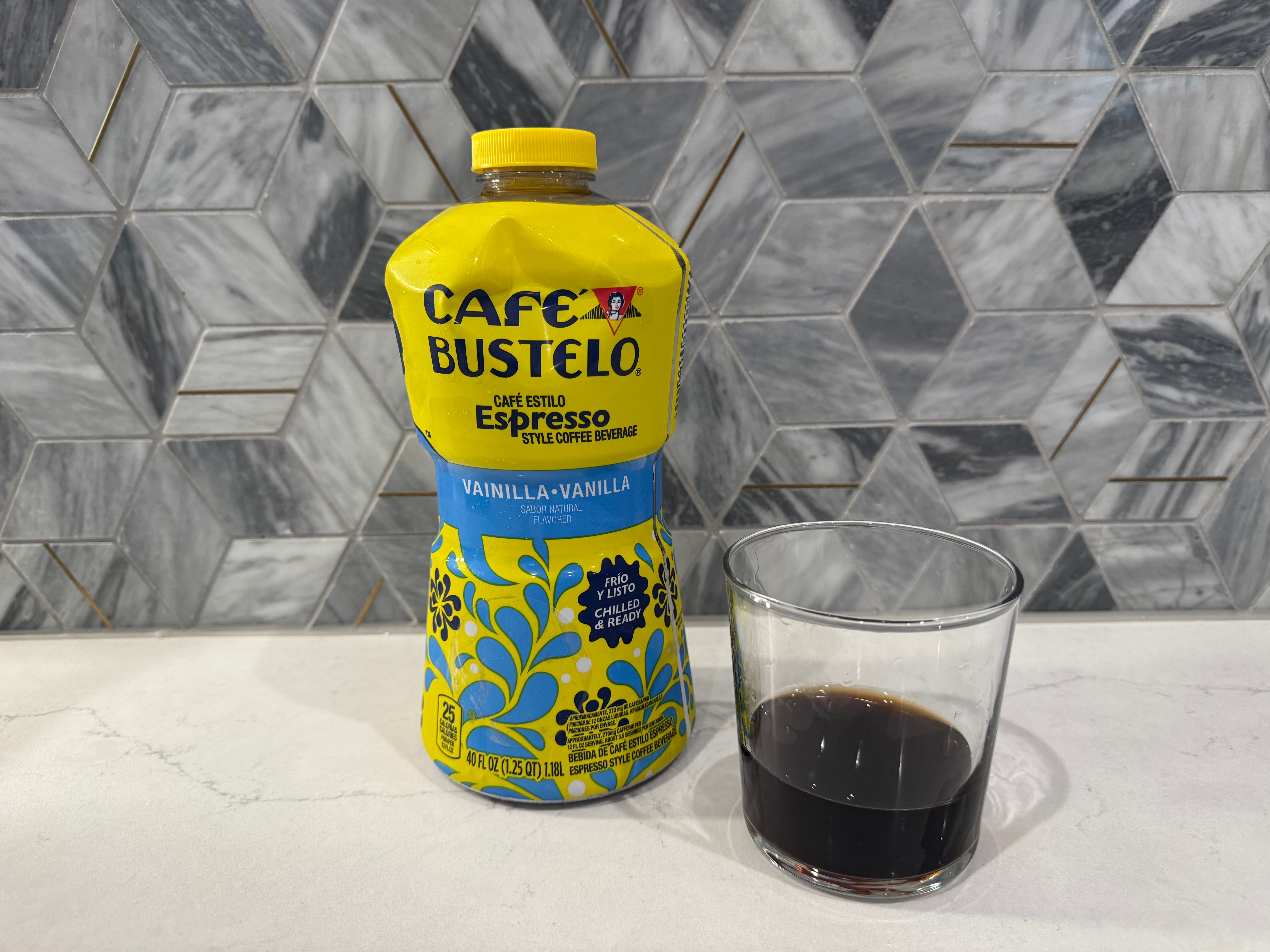 Cafe Bustelo vanilla iced coffee bottle next to glass of iced coffee