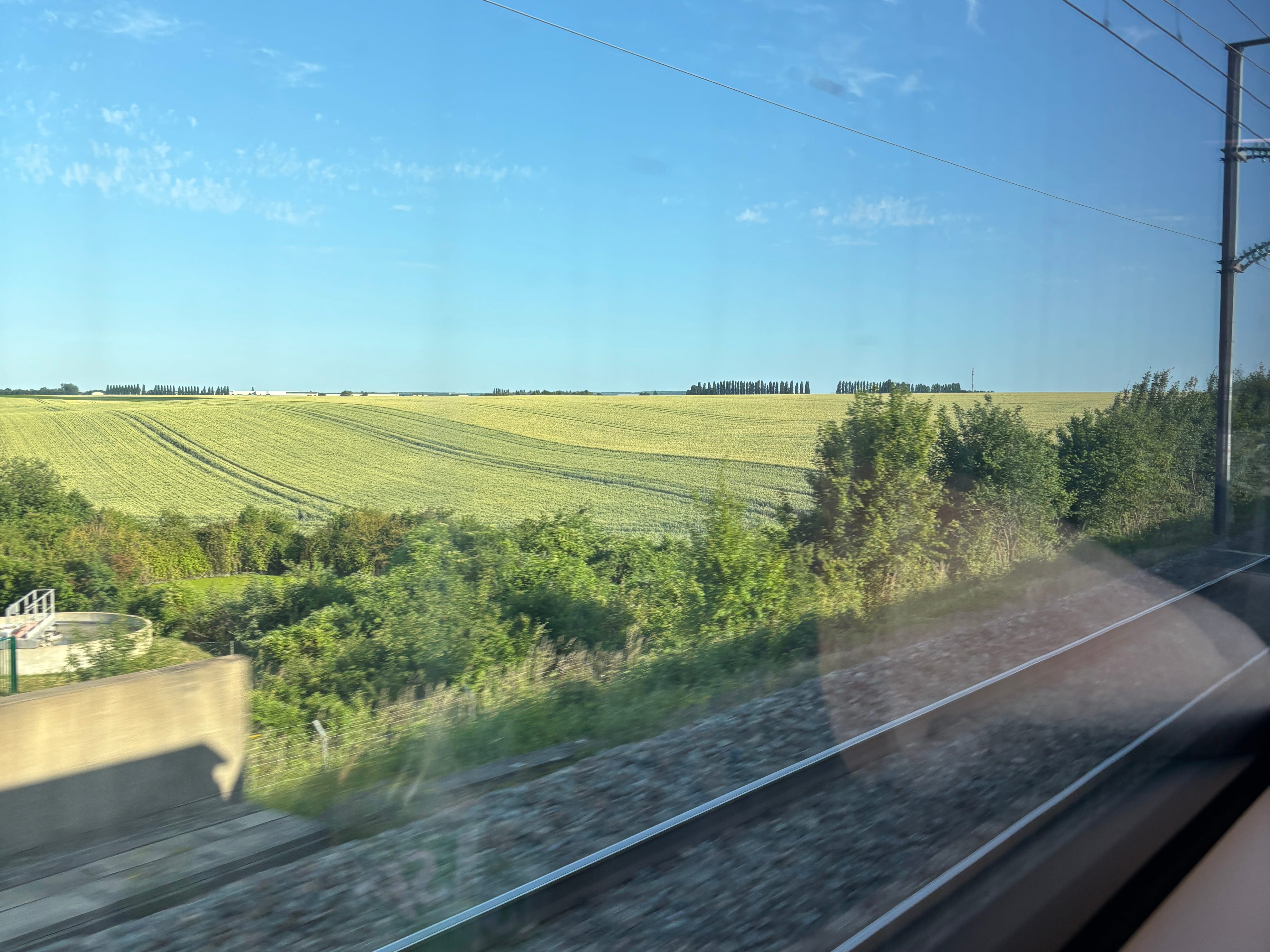 The French countryside as seen from a passing train
