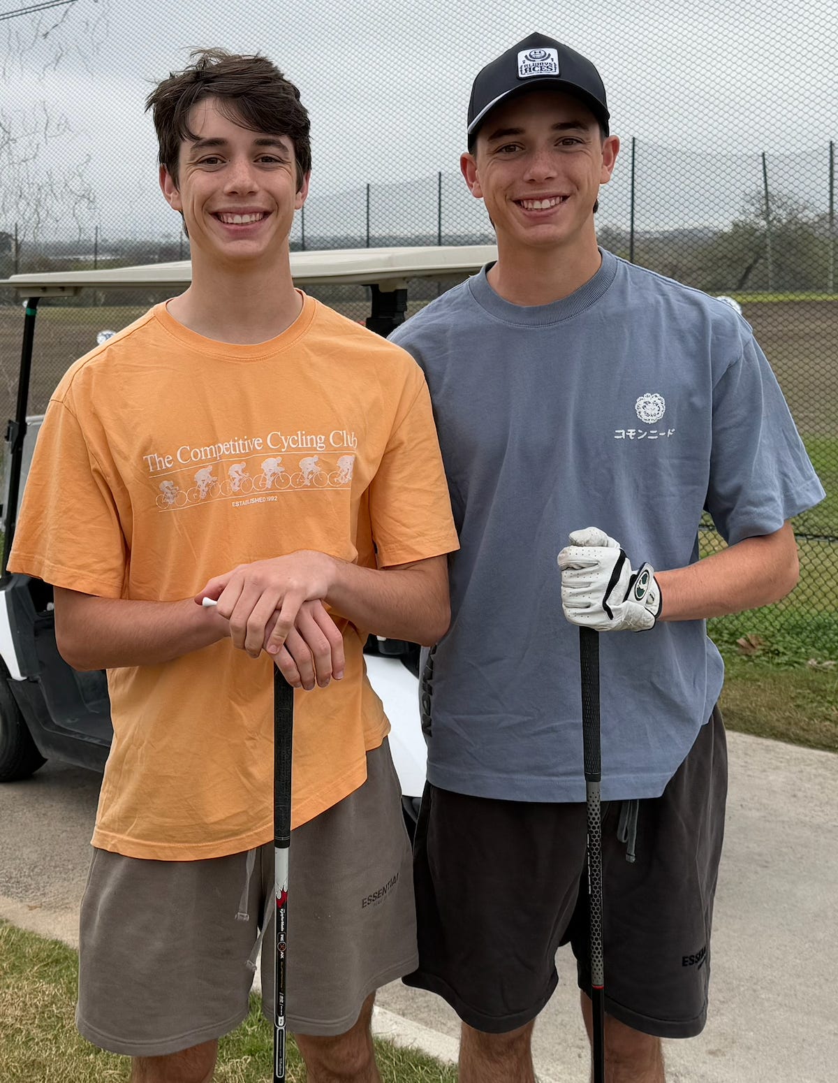 Twins playing golf