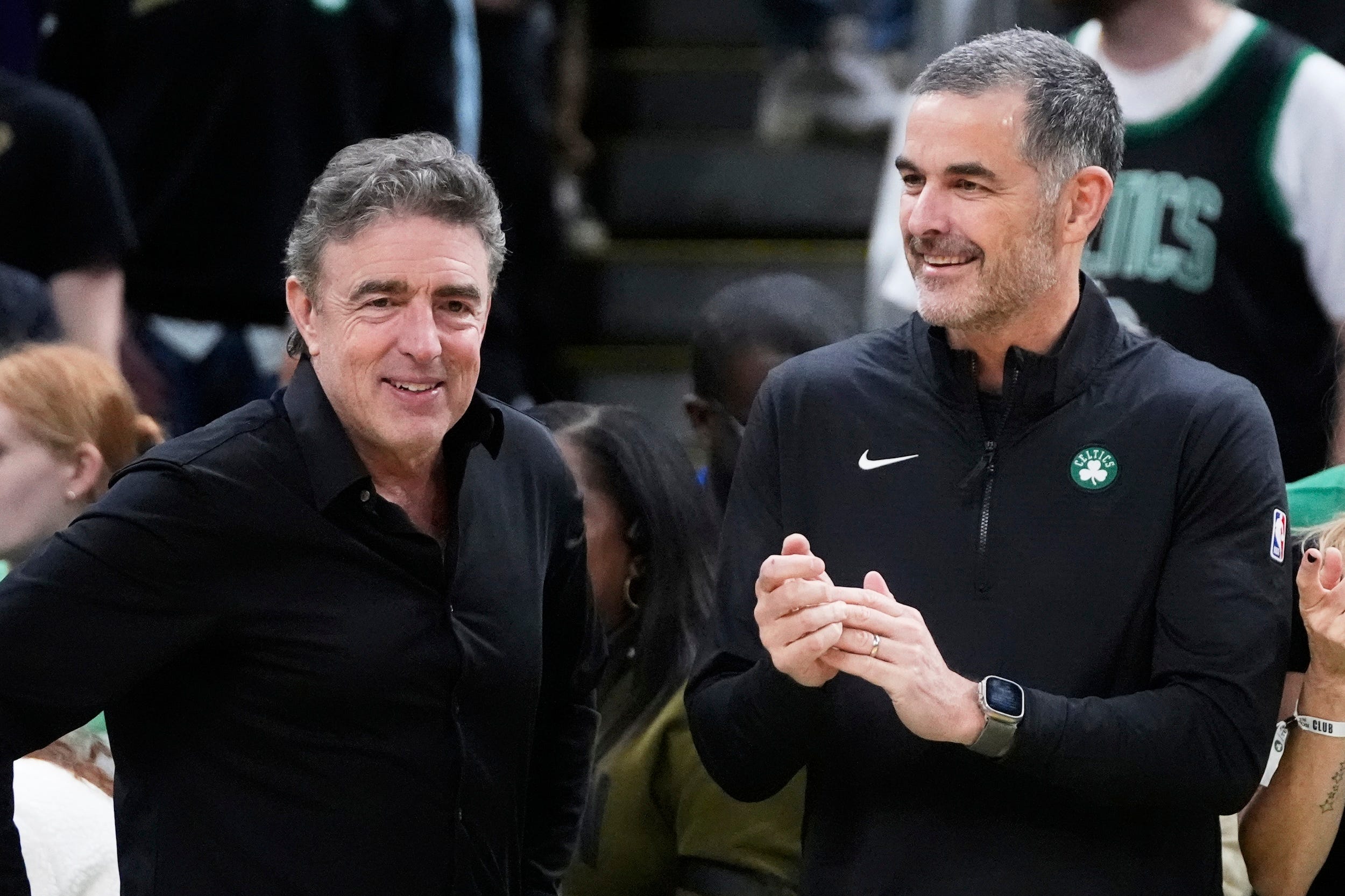Wyc Grousbeck stands with William Chisholm