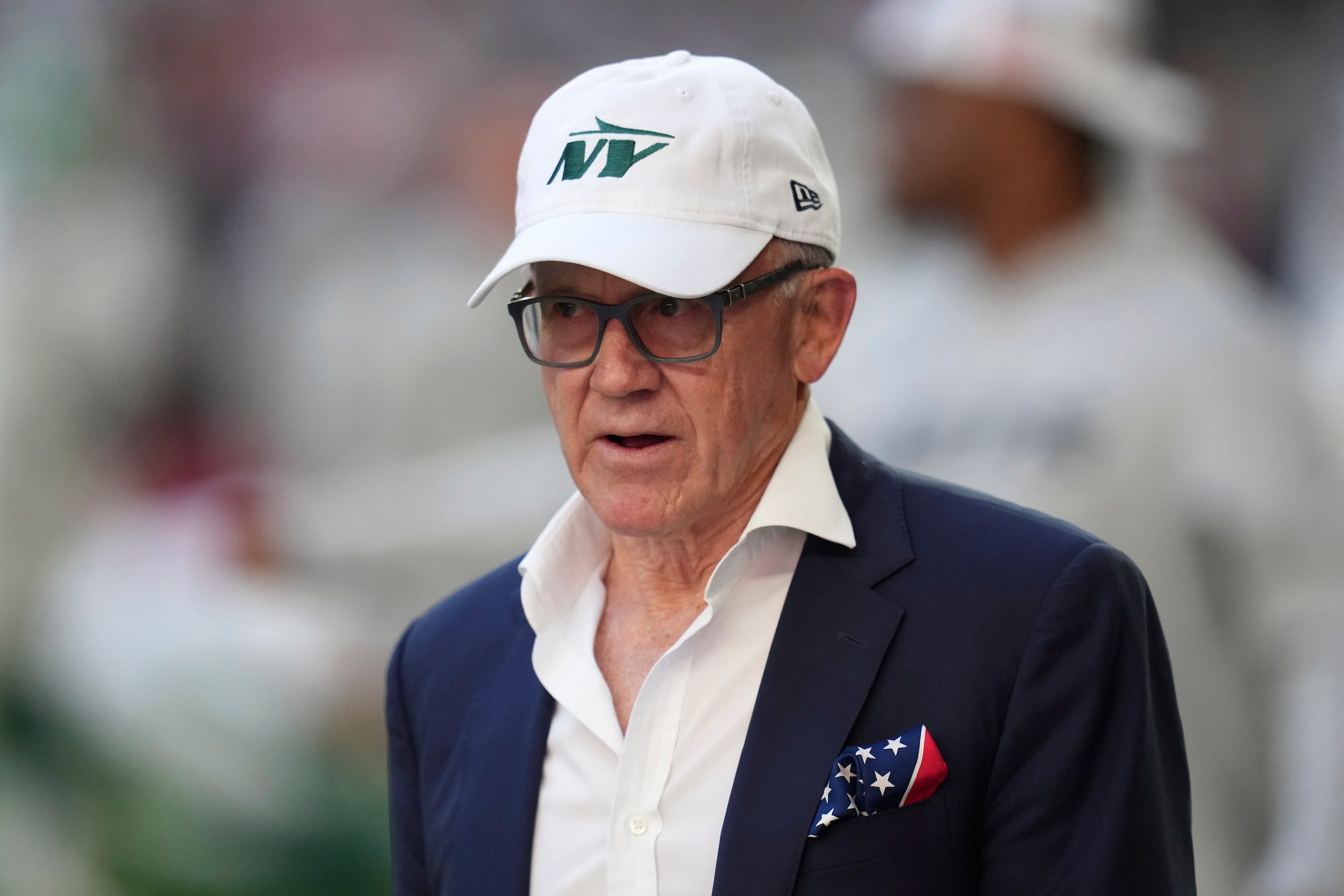 Woody Johnson watches his team prior to a Jets game