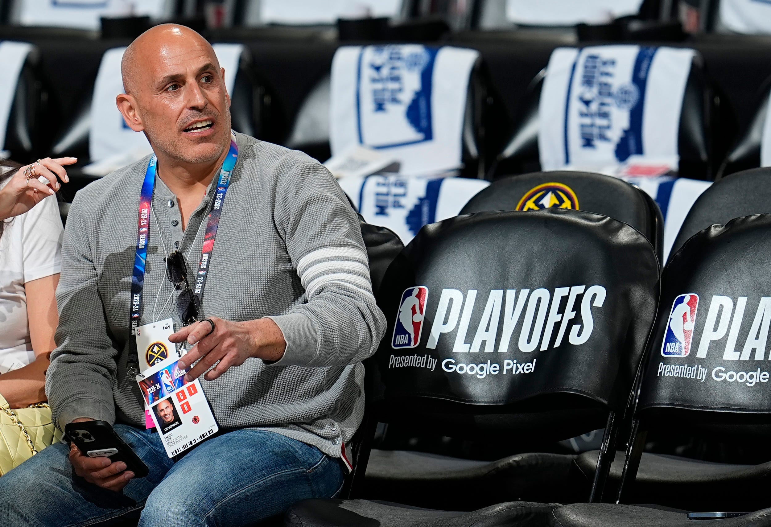 Marc Lore talks before a Minnesota Timberwolves playoff game