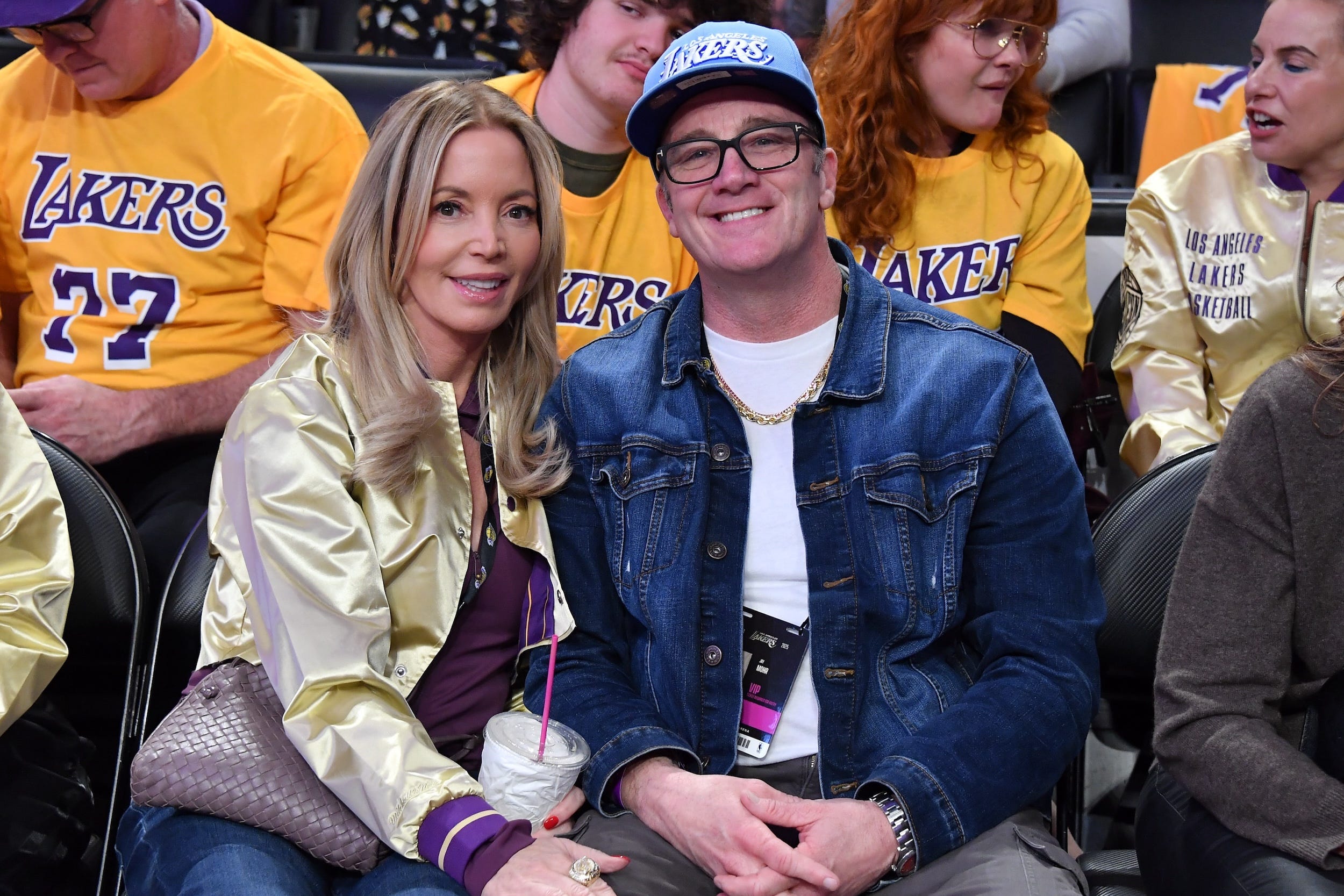 Jeanie Buss and Jay Mohr pose for a photo at a Lakers game