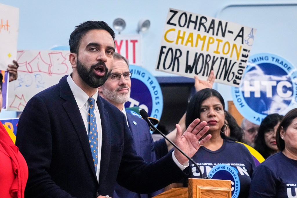 Zohran Mamdani speaking at a rally.