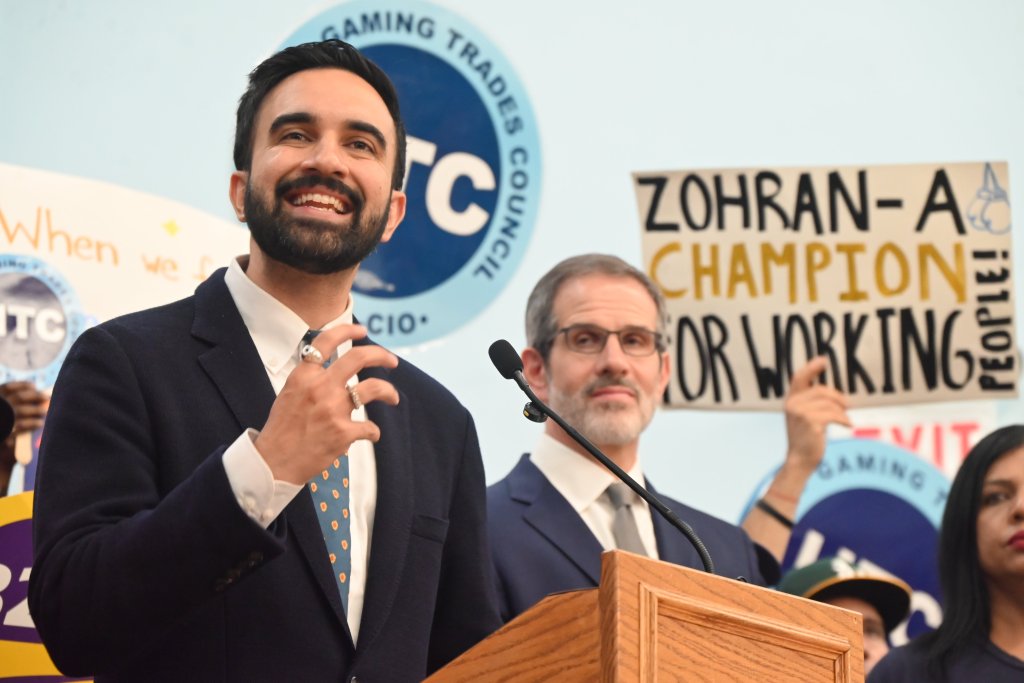 Zohran Mamdani speaking at a NYC mayoral primary victory rally.
