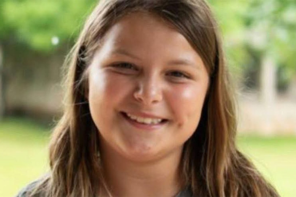 Photo of a young girl with long brown hair.