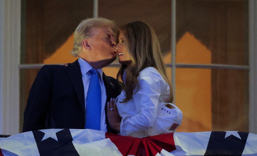 President Trump kisses first lady Melania Trump during the Fourth of July celebration in Washington, DC.