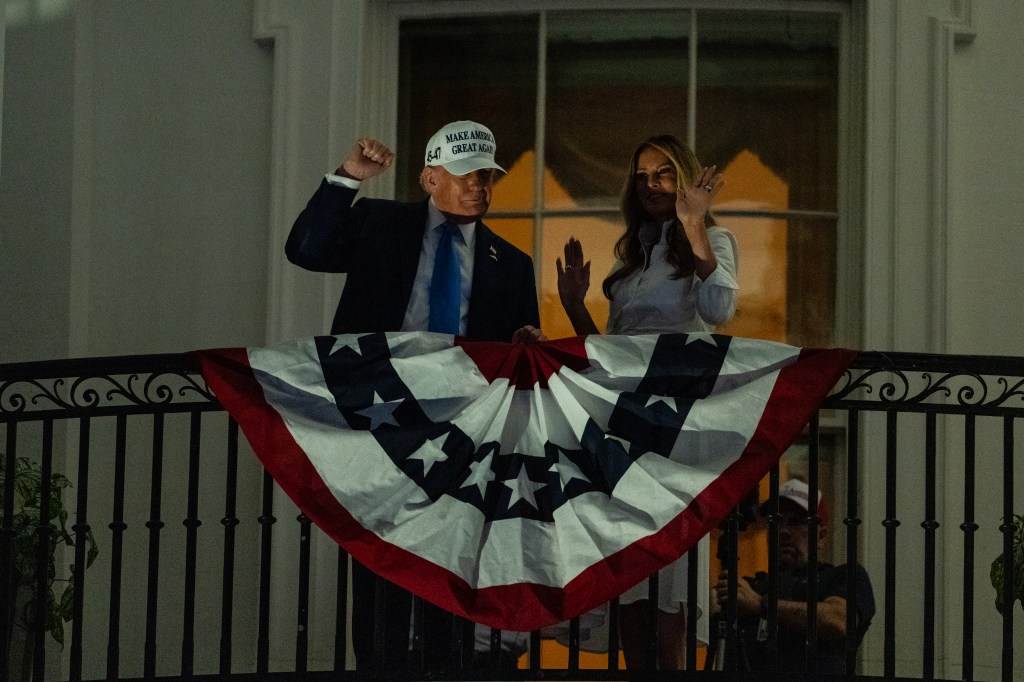 President Donald Trump and first lady Melania Trump dance on the White House Balcony during the Fourth of July Celebration Fireworks in Washington, DC, on July 4, 2025.