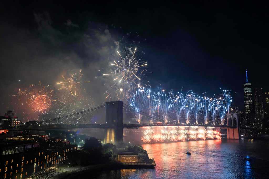 Fireworks over the Brooklyn Bridge in New York City.