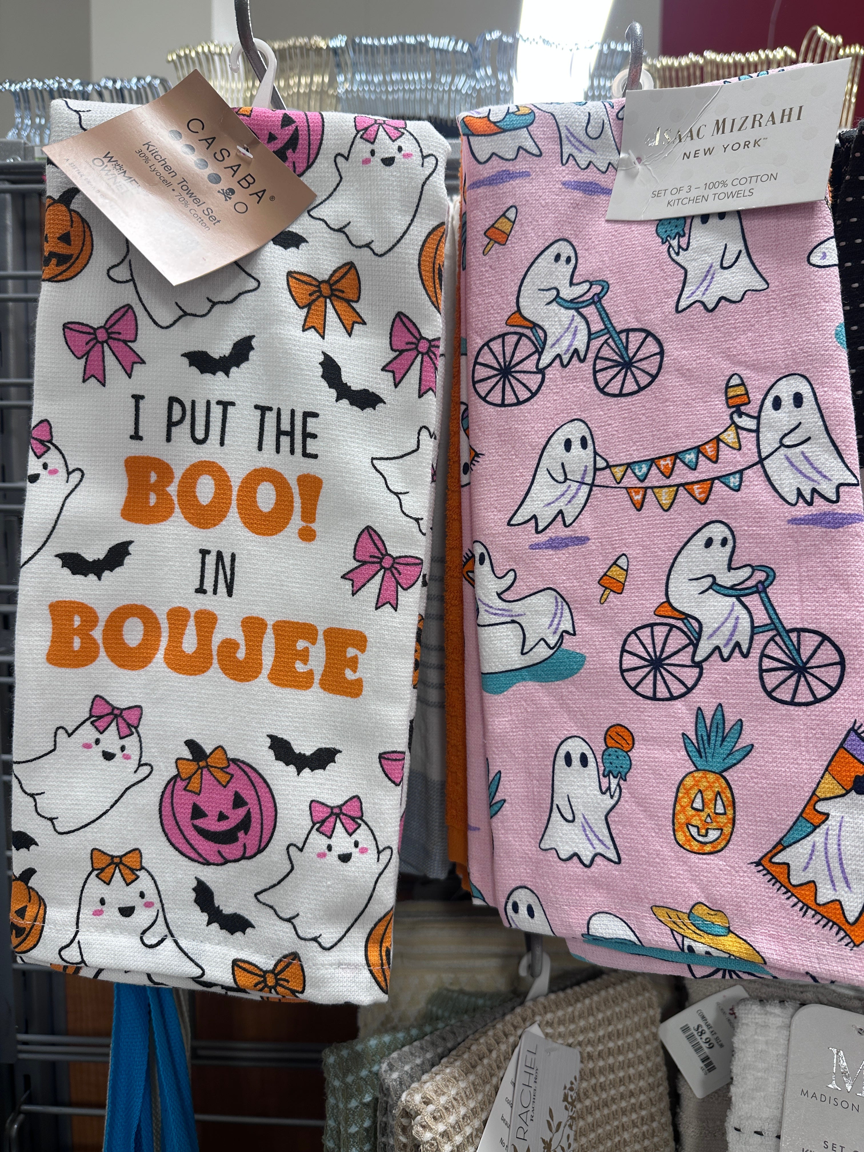 pink dish towels in a store