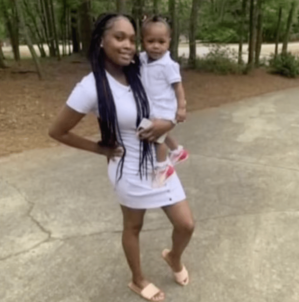 Mi’ckeya Montgomery holds her daughter before her death in 2022.
