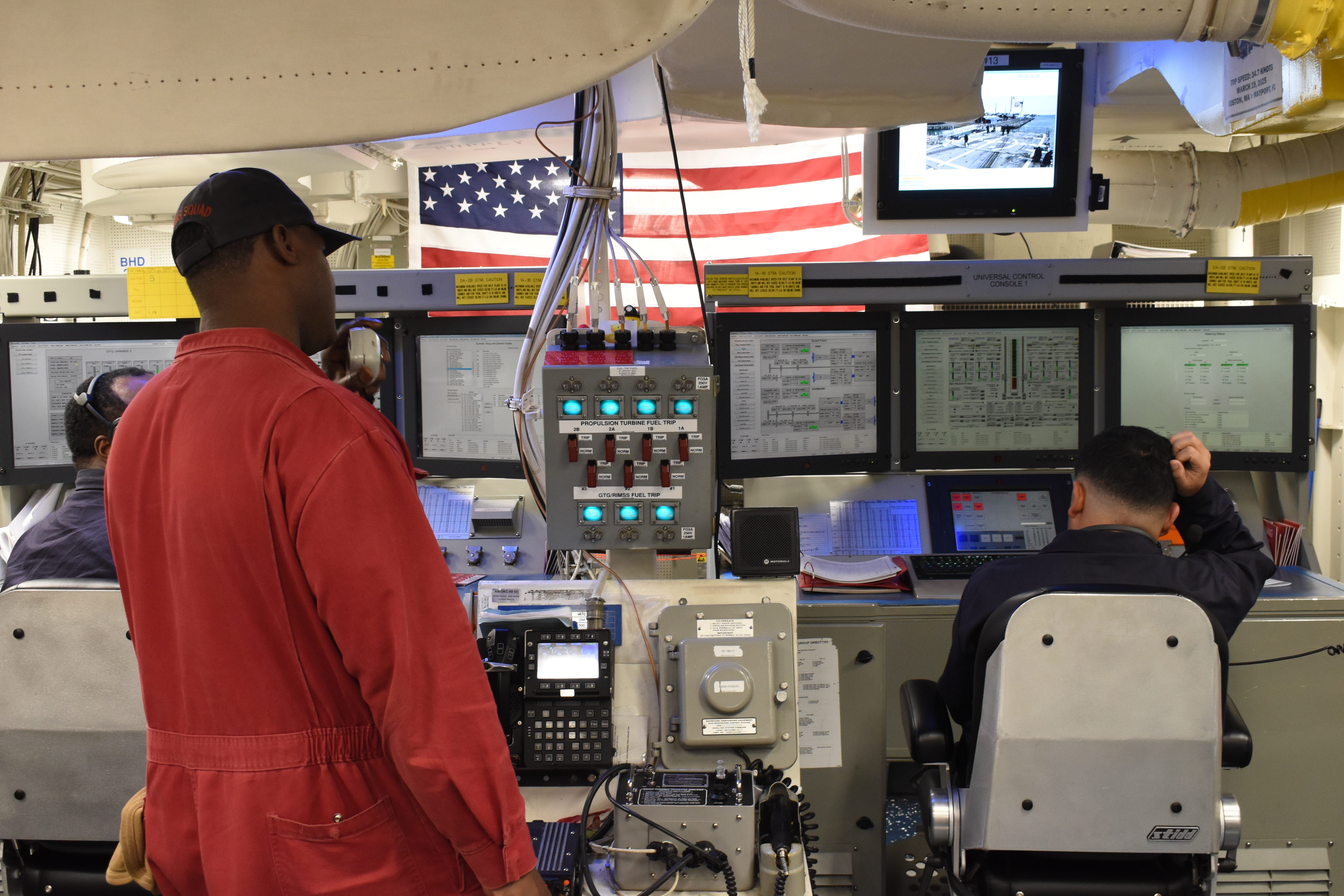 Sailors aboard the Navy destroyer USS Thomas Hudner in May 2025.