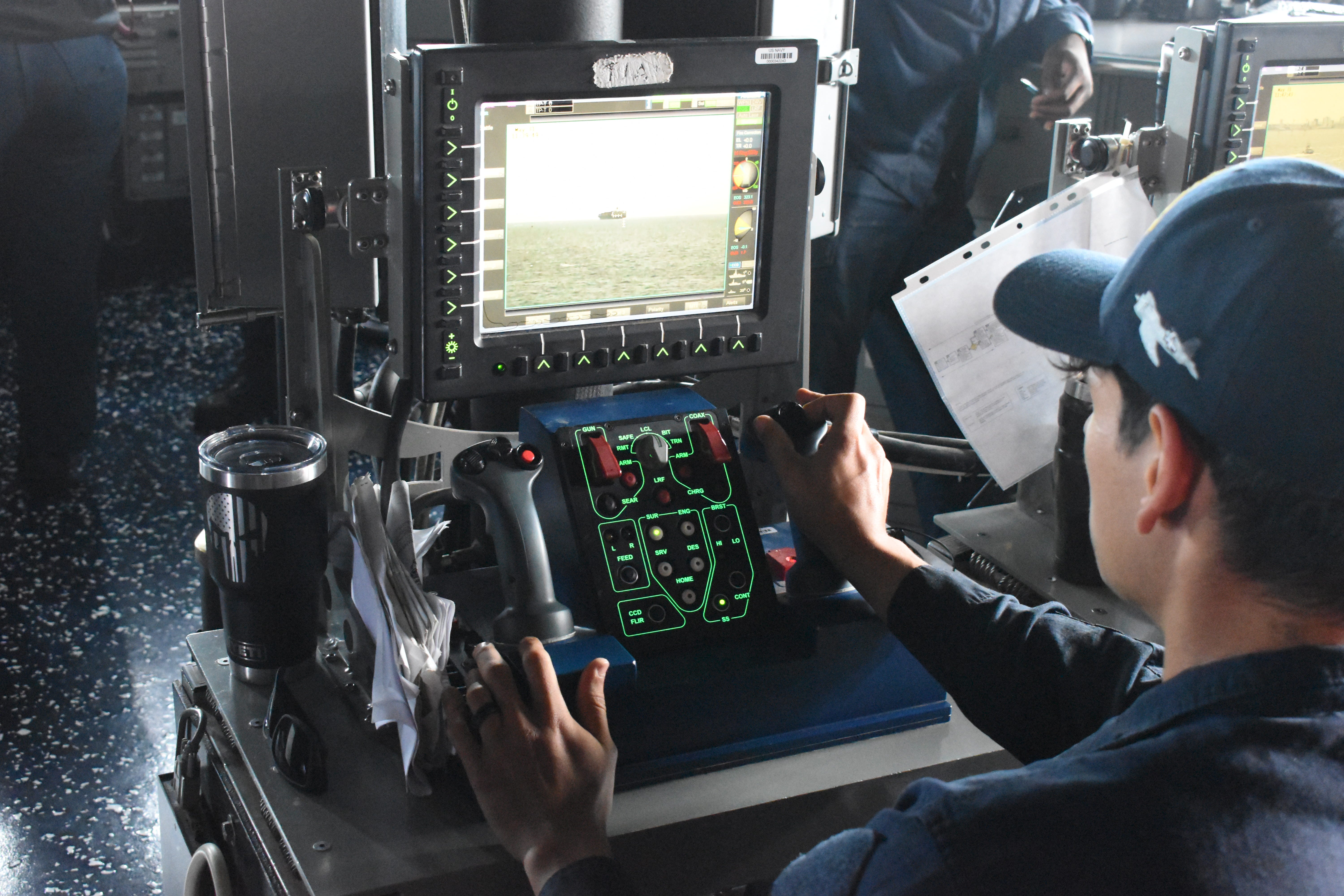 A sailor works aboard the Navy destroyer USS Thomas Hudner in May 2025.