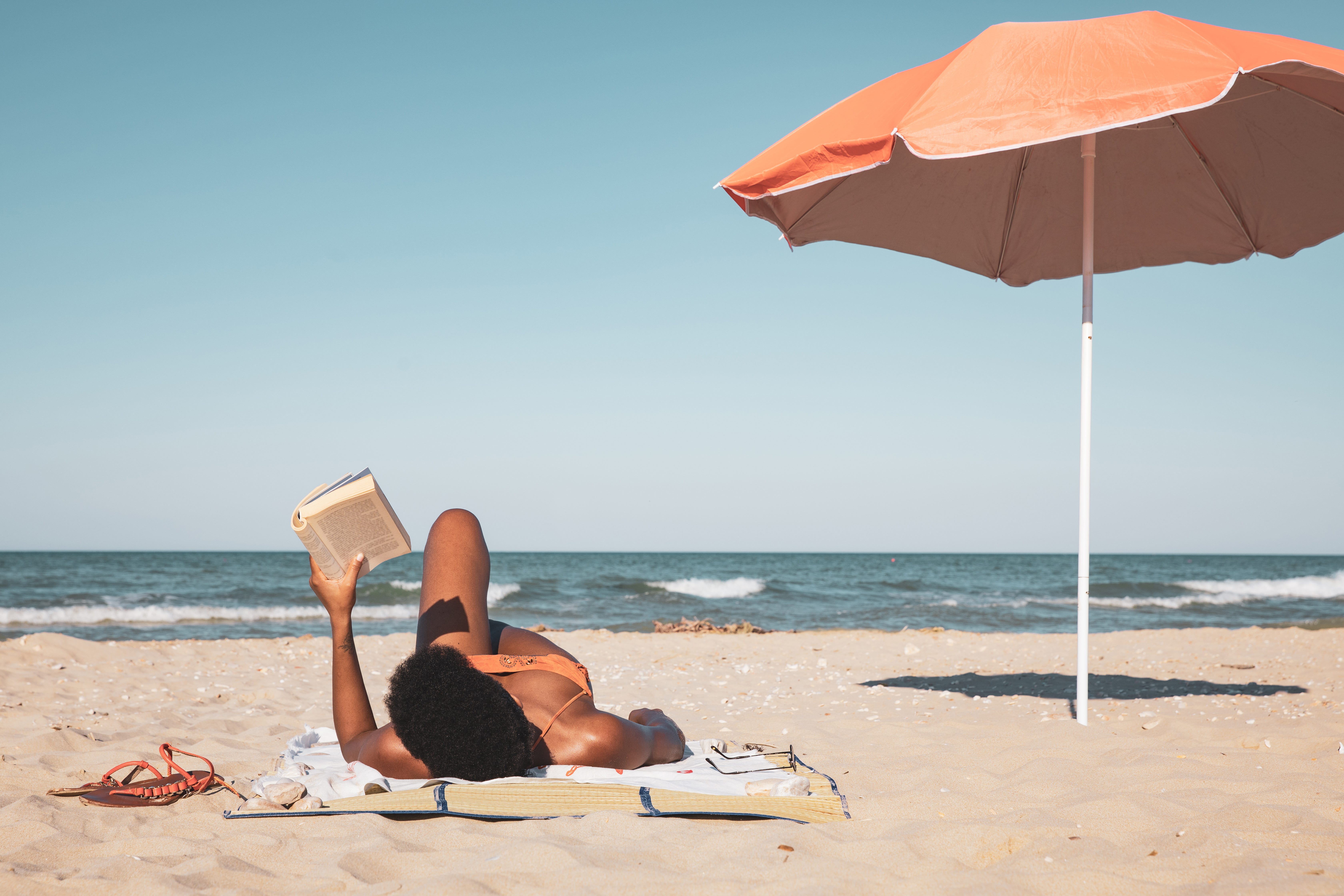 Woman reading on the beach