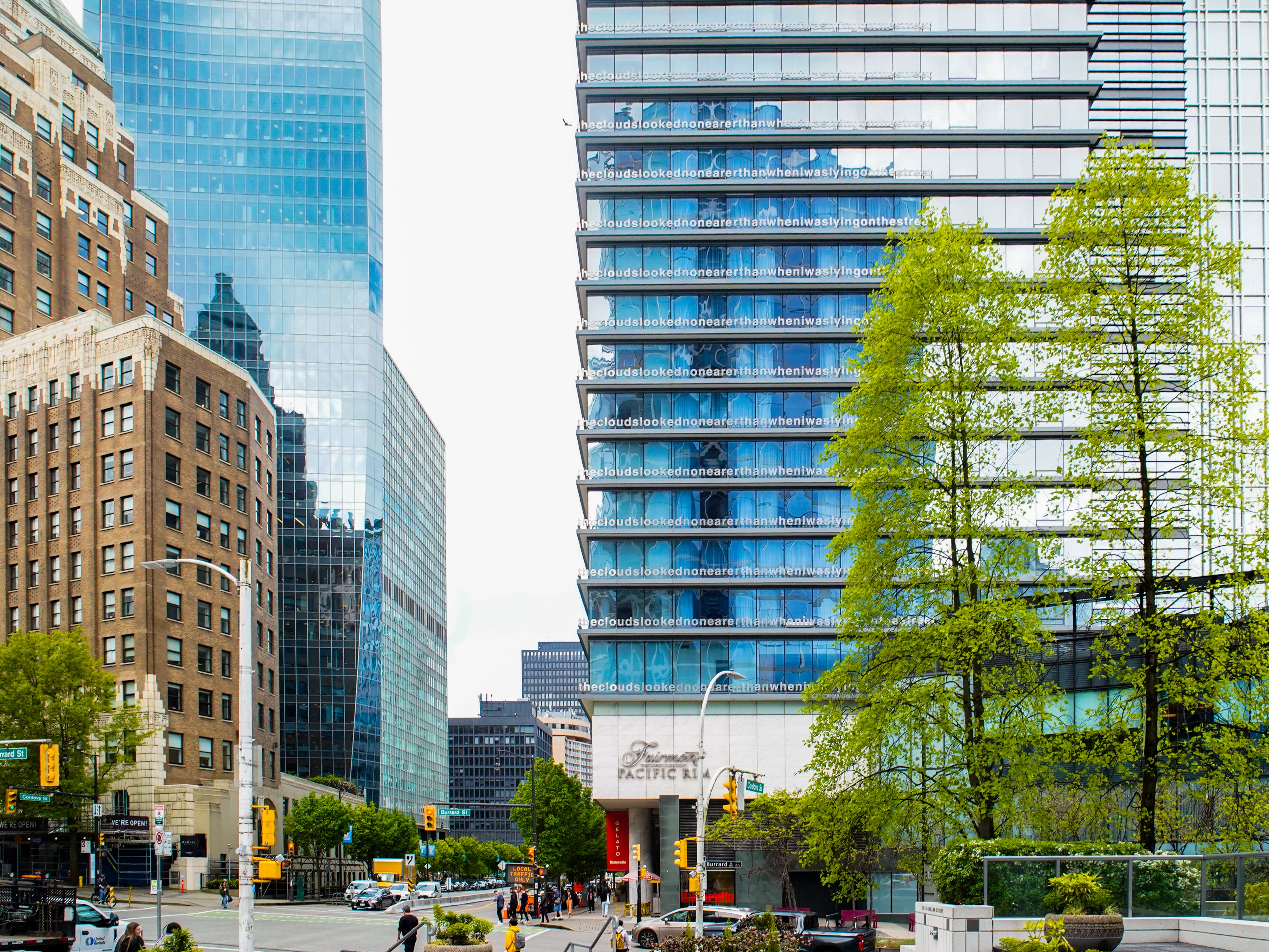 Fairmont Pacific Rim stands among skyscrapers in Vancouver