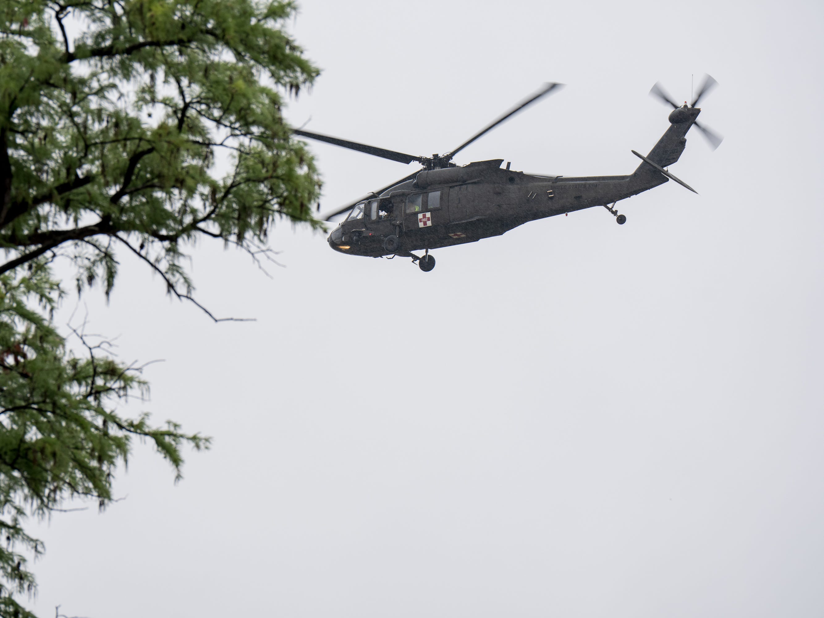 A Black Hawk helicopter conducts rescue operations along the Guadalupe River on July 4, in Kerrville, Texas.