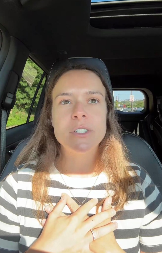 Biggers sitting in a car speaking to camera.