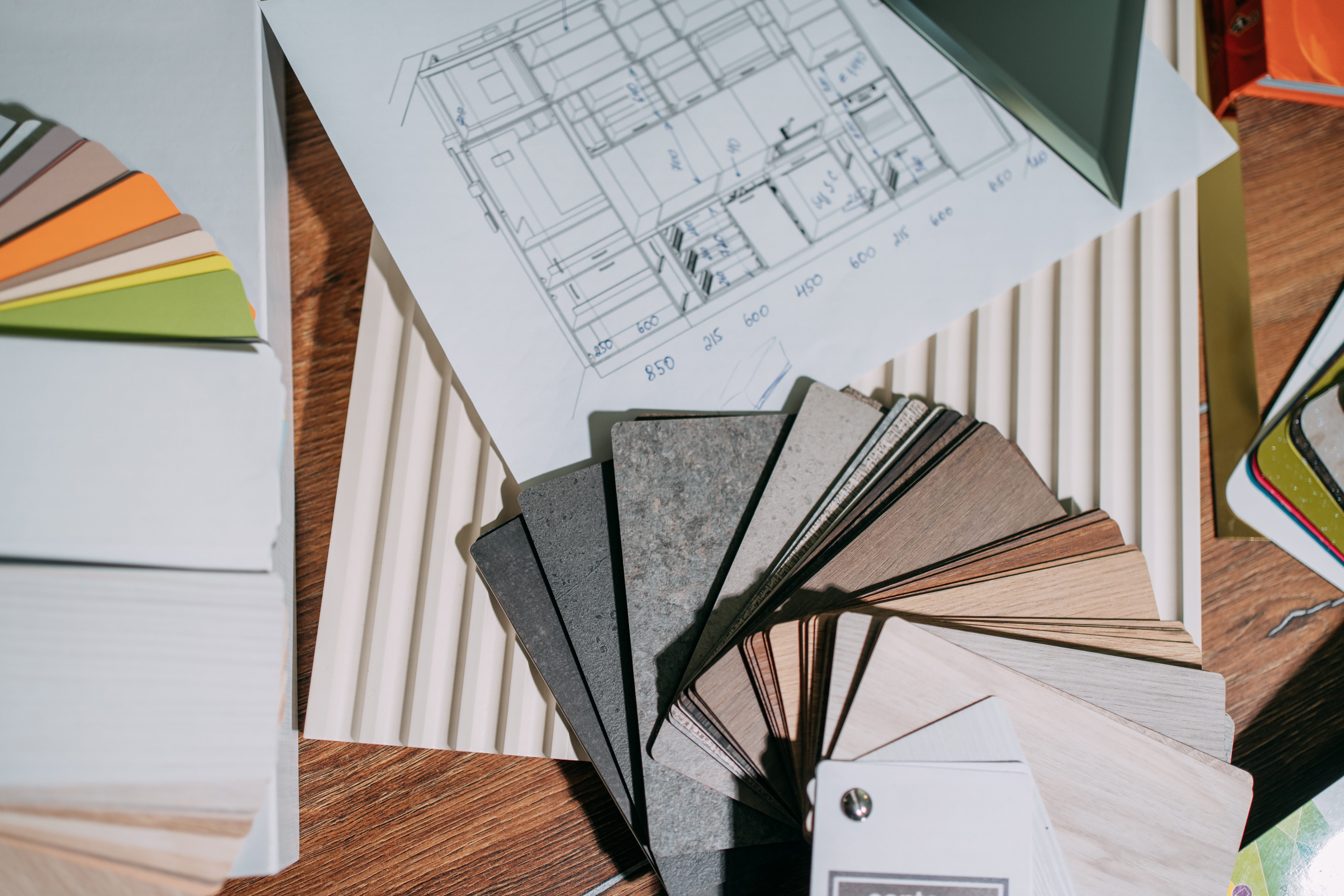 Material swatches on table with architectural sketch
