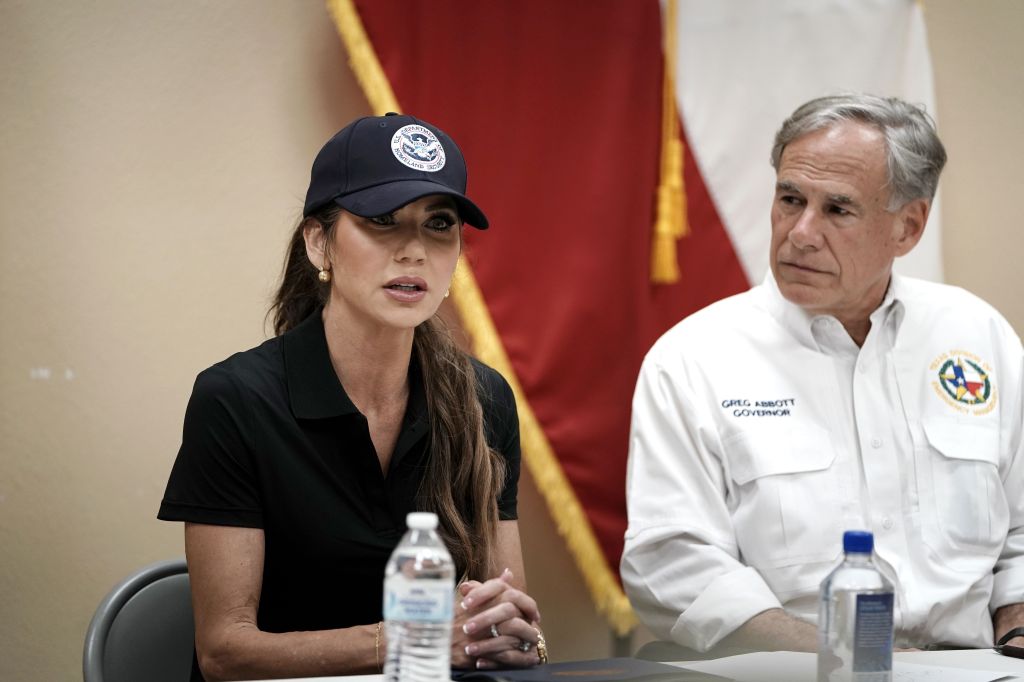 Secretary of Homeland Security Kristy Noem and Texas Governor Greg Abbott at a press conference.