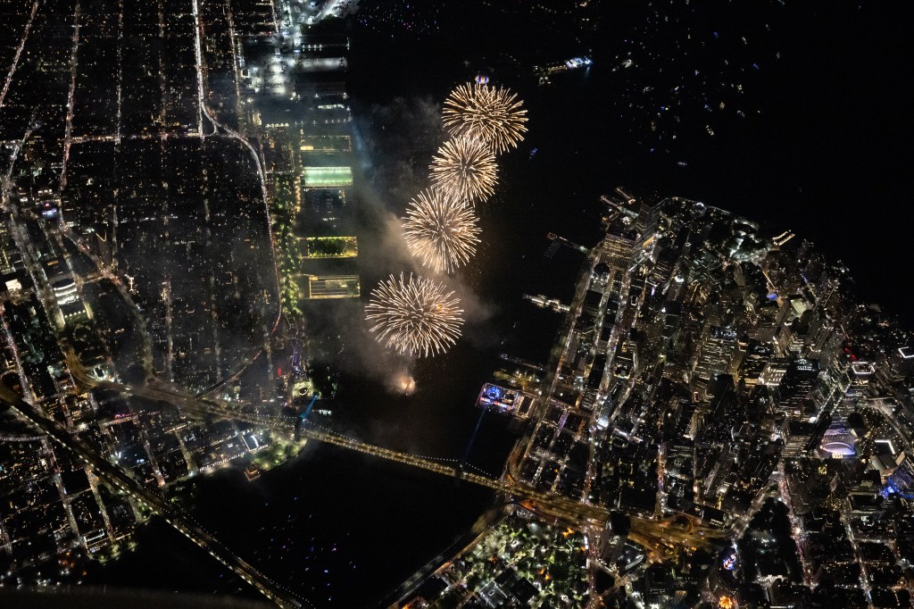 Aerial view of Macy's Fourth of July fireworks over the East River.