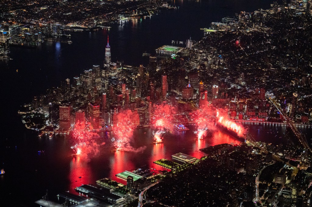 Aerial view of Macy's Fourth of July fireworks over the East River in New York City.