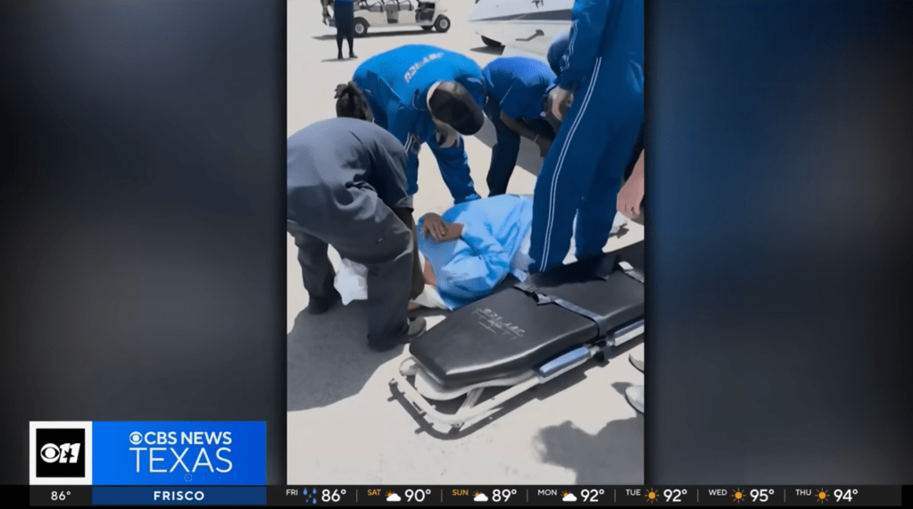 Slough is transferred to a stretcher before being loaded up on a plane for the trip to Miami, Florida.