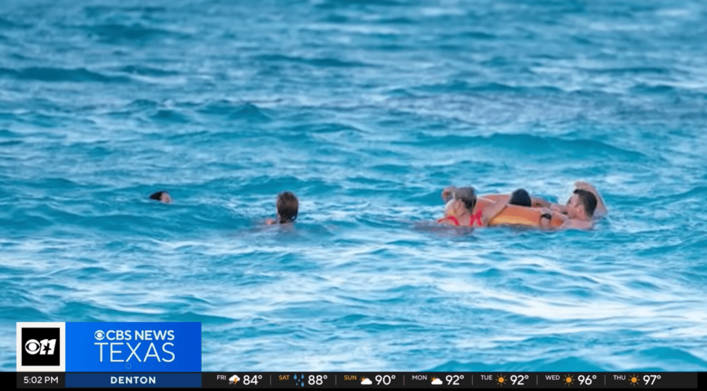 The Slough family hold their father in a float as they rush him to shore after the hit-and-run.