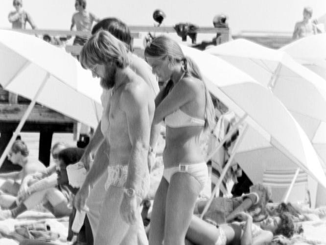 Susan Backlinie walks on the beach during the production of