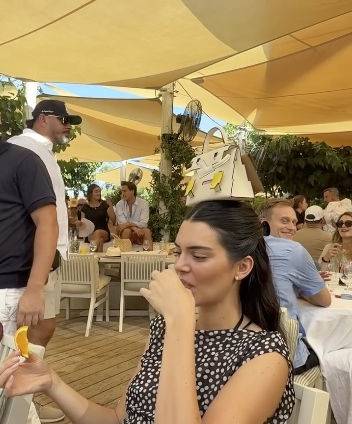 Kendall Jenner taking a shot