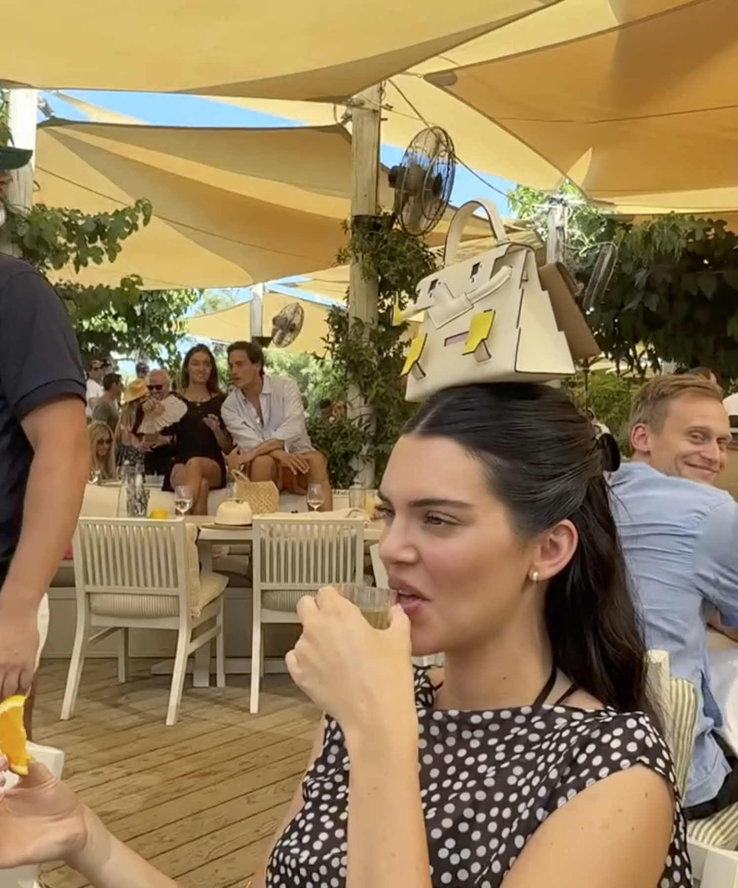 Kendall Jenner taking a shot