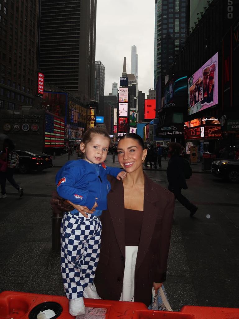 Jenna Johnson poses with her son.