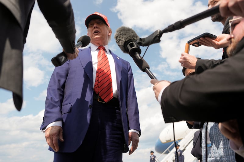 U.S. President Donald Trump talks to reporters upon his arrival at Morristown Municipal Airport in Morristown, New Jersey, U.S., June 20, 2025. REUTERS/Ken Cedeno
