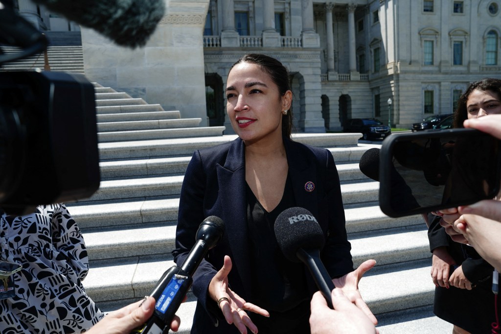 Rep. Alexandria Ocasio-Cortez speaking to reporters.
