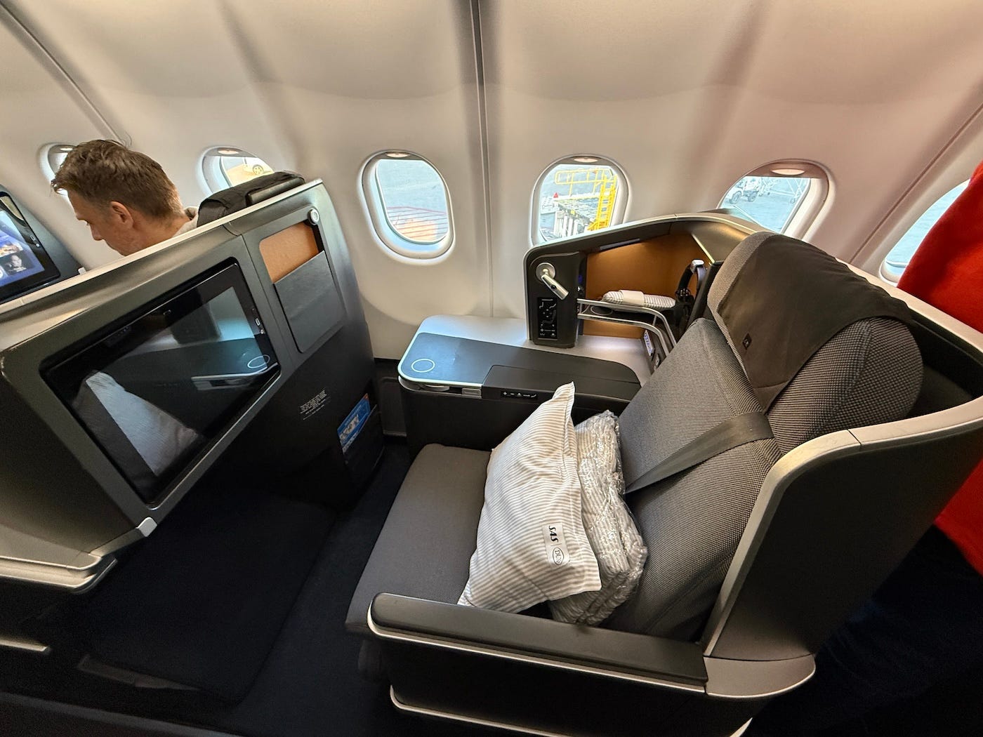 Thompson Vantage XL seat on SAS business class with pillows on it