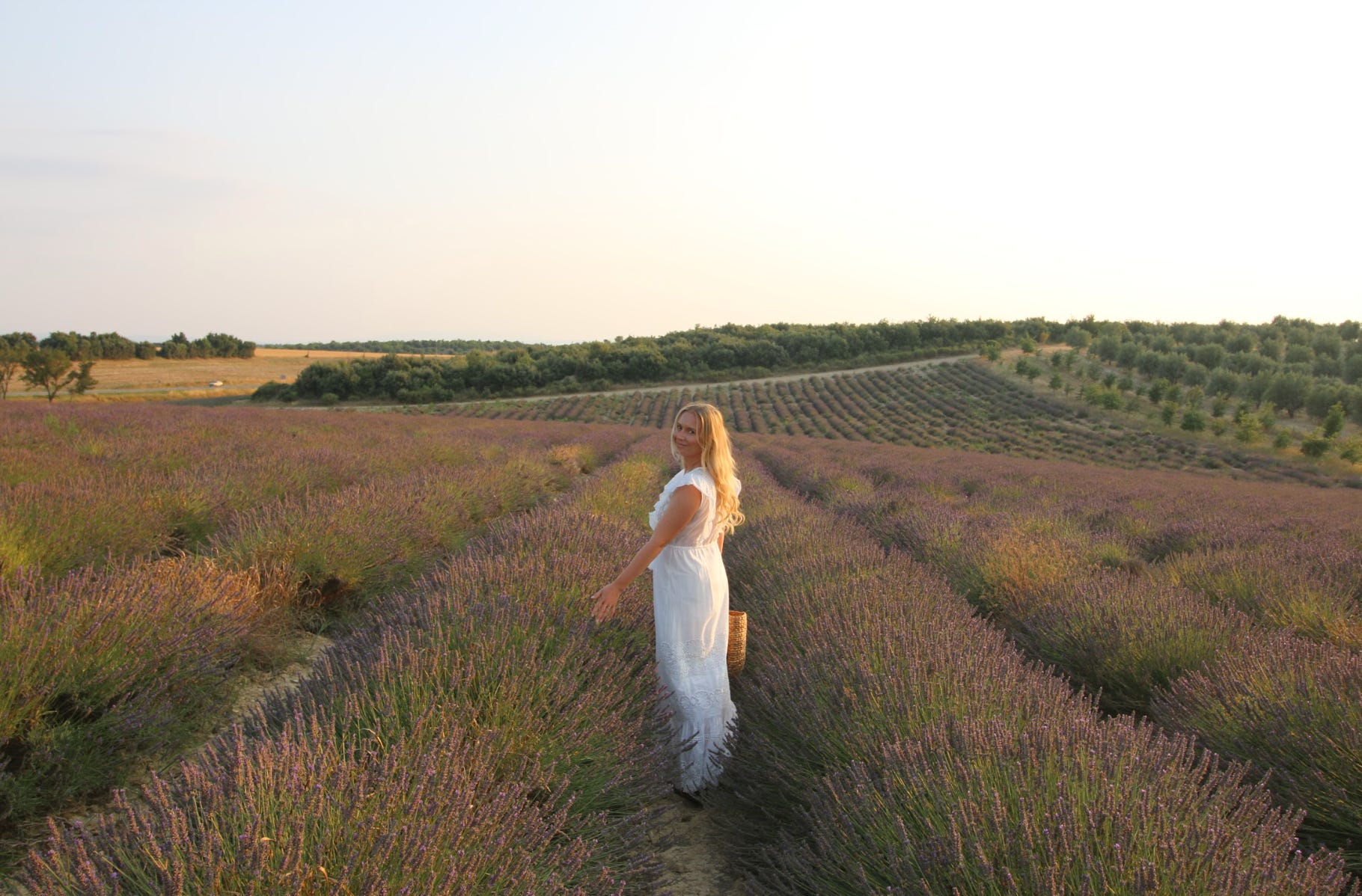 The writer in a field in France.