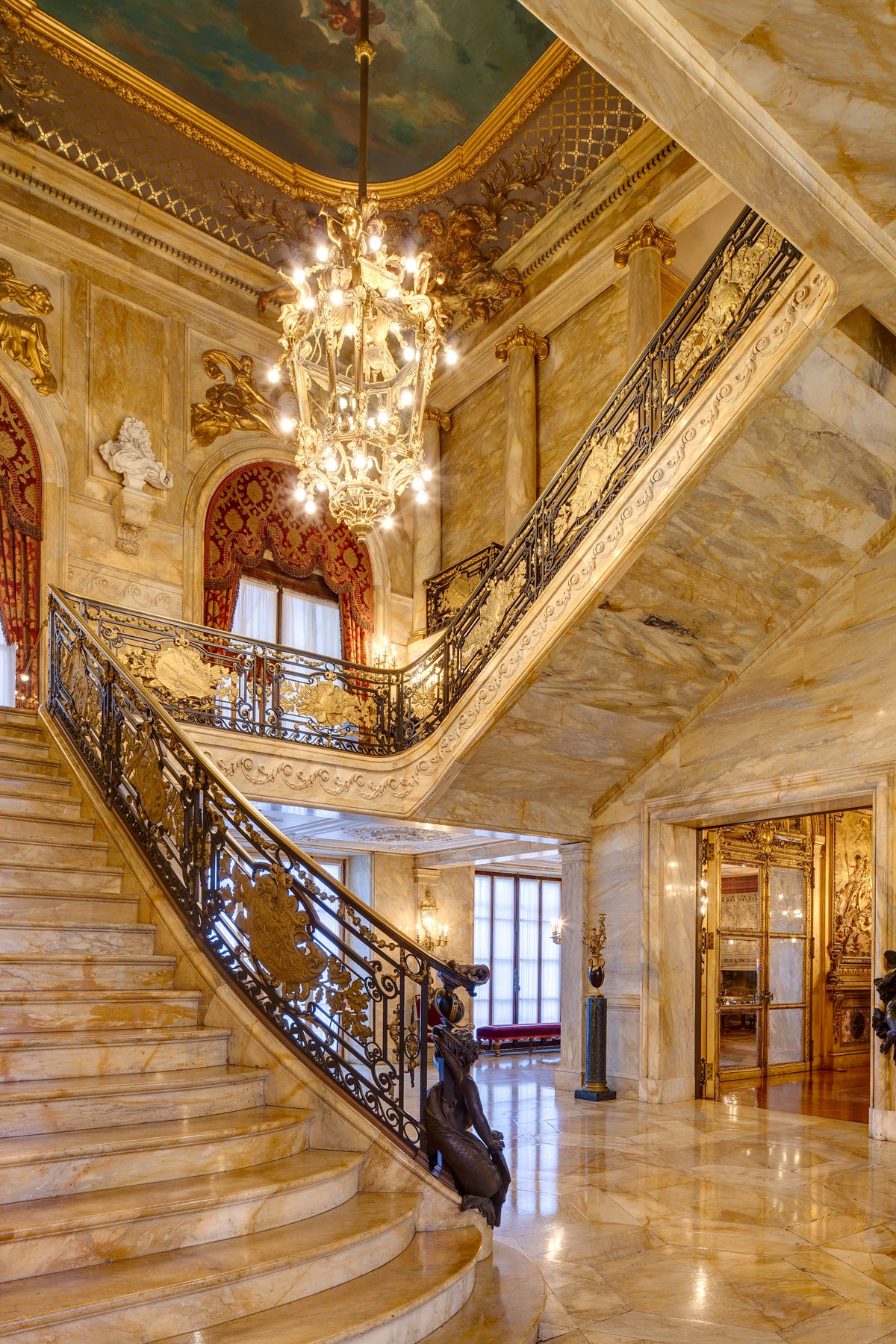 The foyer and staircase at Marble House.