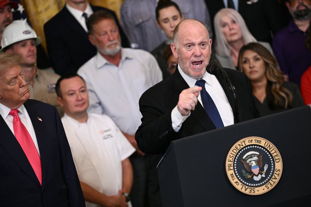 Tom Homan speaking at a White House event with Donald Trump.