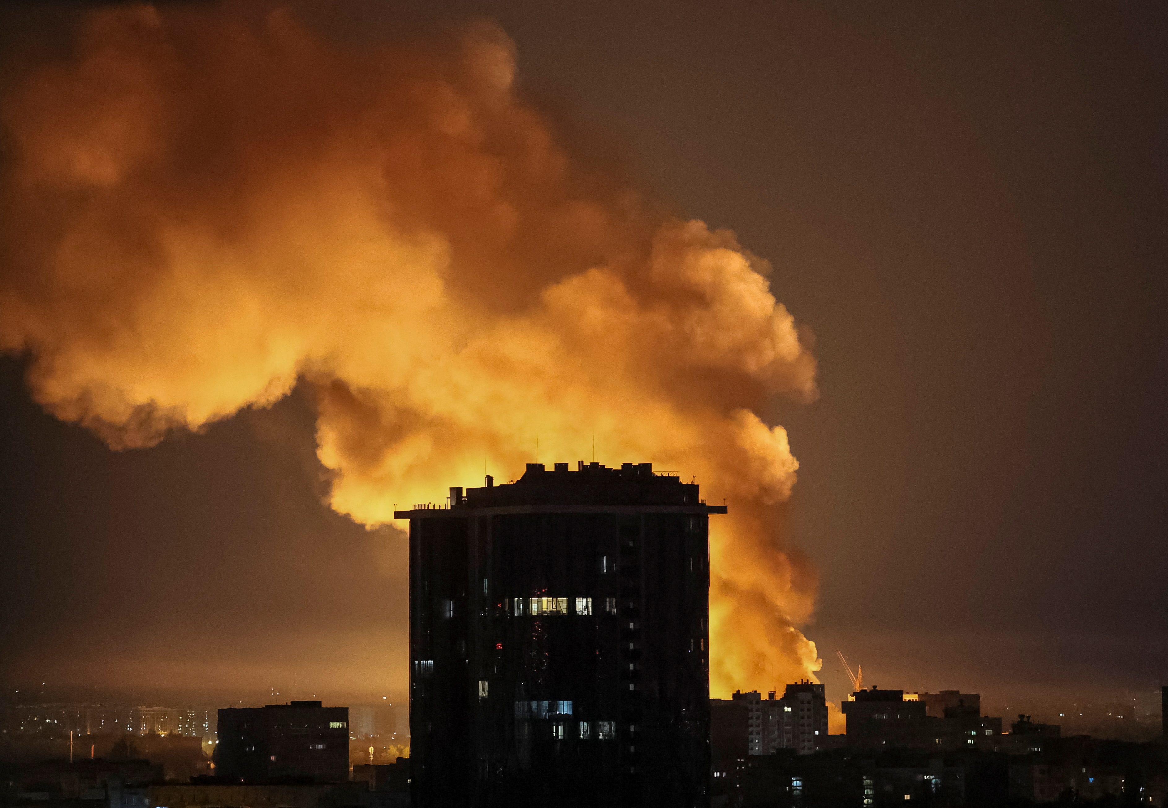 An explosion of a drone lights up the sky over the city during a Russian drone and missile strike, amid Russia's attack on Ukraine, in Kyiv, Ukraine July 4, 2025.