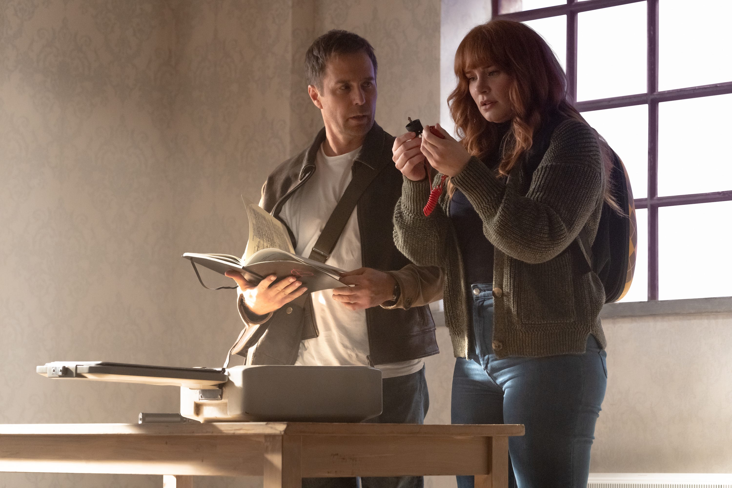 Sam Rockwell as Aidan and Bryce Dallas Howard as Elly Conway in "Argylle."